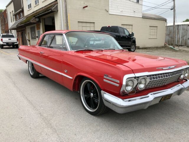 Red 1963 Chevrolet Impala with Red interior