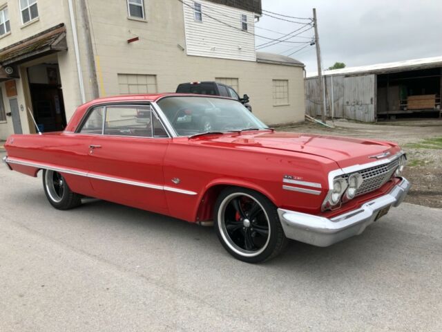 Red 1963 Chevrolet Impala with Red interior
