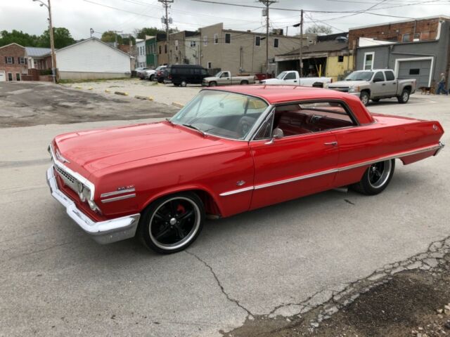 Red 1963 Chevrolet Impala with Red interior