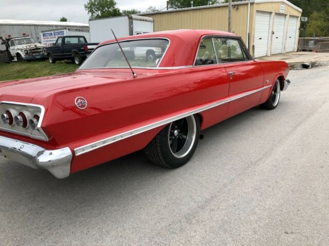 Red 1963 Chevrolet Impala with Red interior