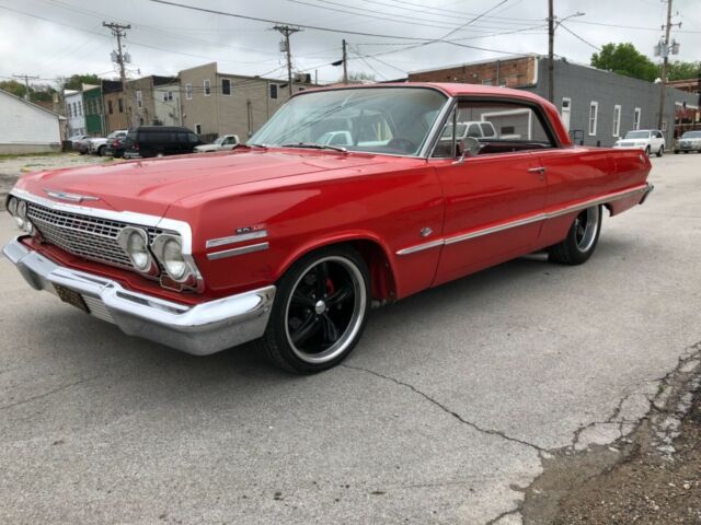 Red 1963 Chevrolet Impala with Red interior