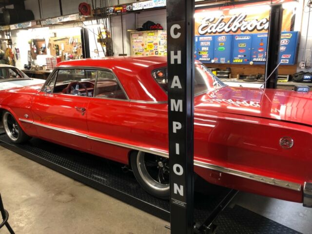 Red 1963 Chevrolet Impala with Red interior