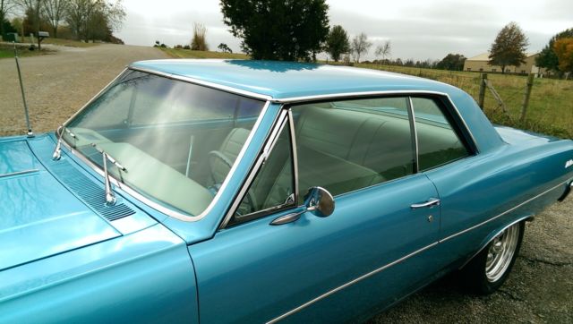 Blue 1965 Chevrolet Chevelle Coupe with Tan interior