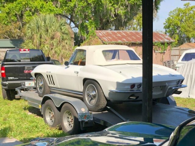 White 1965 Chevrolet Corvette Convertible with Red interior
