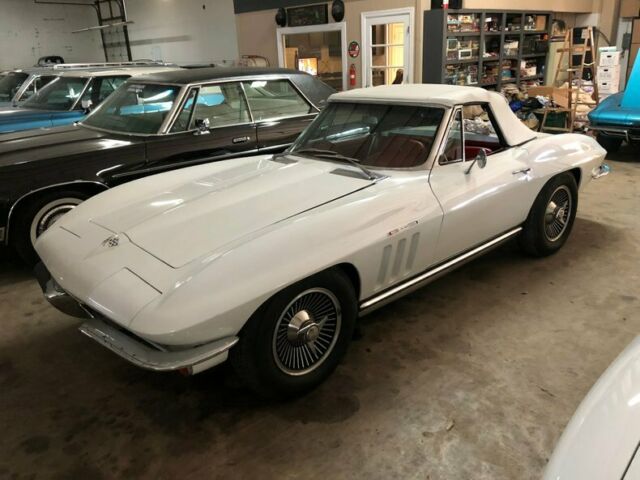 White 1965 Chevrolet Corvette Convertible with Red interior