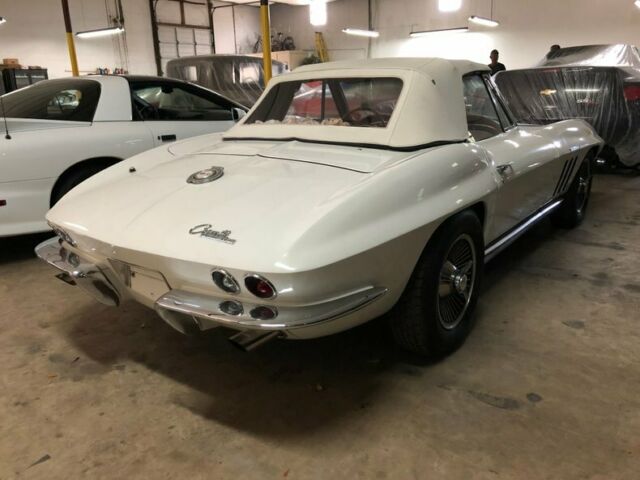 White 1965 Chevrolet Corvette Convertible with Red interior