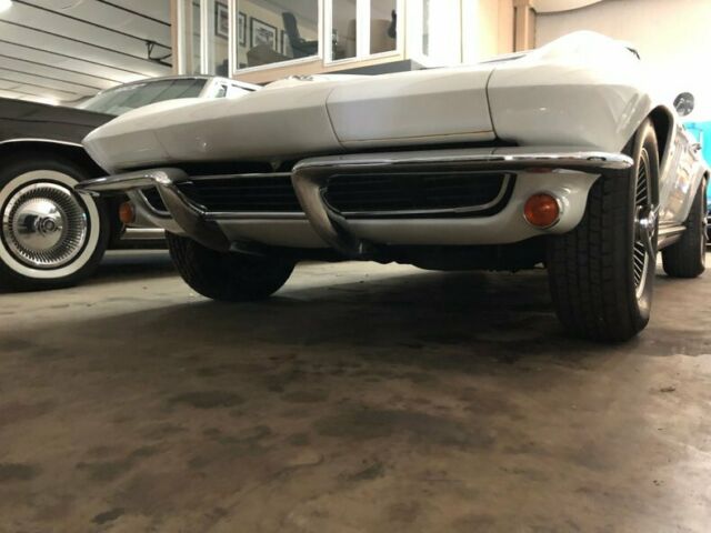 White 1965 Chevrolet Corvette Convertible with Red interior