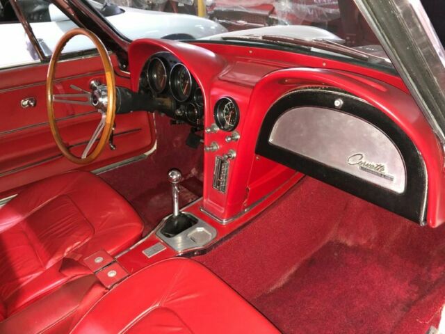 White 1965 Chevrolet Corvette Convertible with Red interior