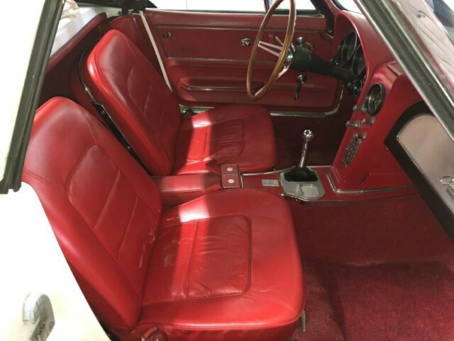White 1965 Chevrolet Corvette Convertible with Red interior