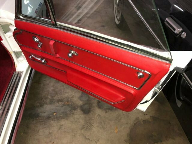 White 1965 Chevrolet Corvette Convertible with Red interior