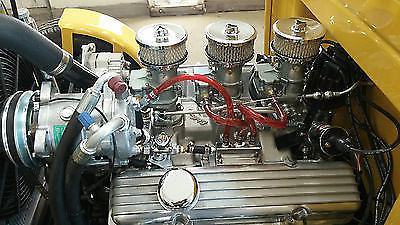 Yellow 1930 Ford Model A Sedan with Gray interior