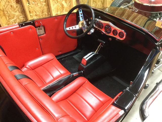 Black 1927 Ford Model A with Red interior