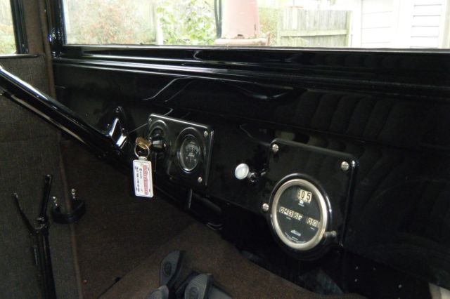 Black 1924 Ford Model T Sedan with Gray interior