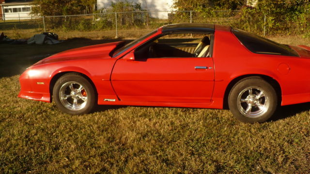 Red 1992 Chevrolet Camaro Hatchback with black and tan interior