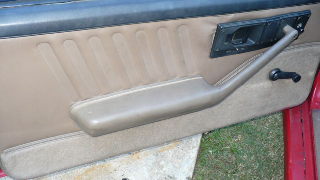 Red 1992 Chevrolet Camaro Hatchback with black and tan interior