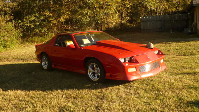 Red 1992 Chevrolet Camaro Hatchback with black and tan interior