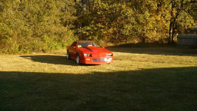 Red 1992 Chevrolet Camaro Hatchback with black and tan interior