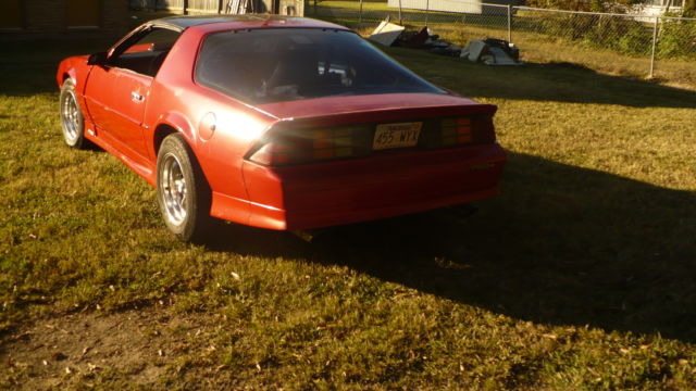 Red 1992 Chevrolet Camaro Hatchback with black and tan interior