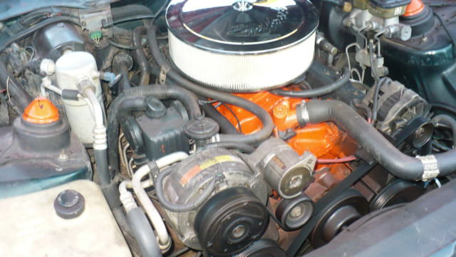 Red 1992 Chevrolet Camaro Hatchback with black and tan interior