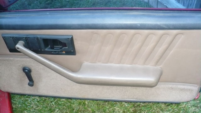 Red 1992 Chevrolet Camaro Hatchback with black and tan interior