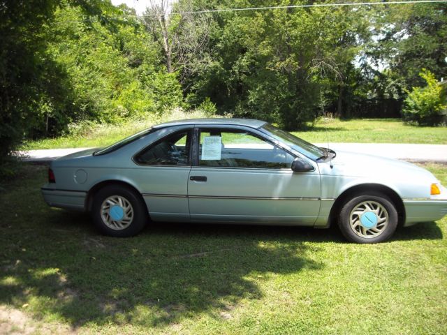 Blue 1991 Ford Thunderbird Coupe with blue/black interior
