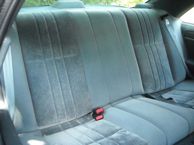 Blue 1991 Ford Thunderbird Coupe with blue/black interior