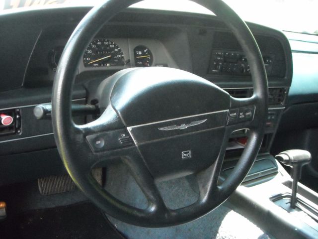 Blue 1991 Ford Thunderbird Coupe with blue/black interior