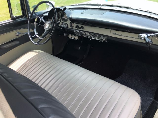 Blue and White 1956 Ford Fairlane Sedan with Gray and White interior