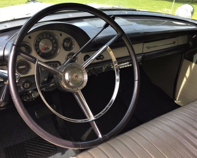 Blue and White 1956 Ford Fairlane Sedan with Gray and White interior
