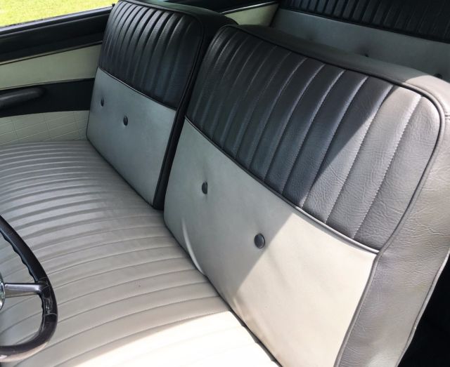 Blue and White 1956 Ford Fairlane Sedan with Gray and White interior