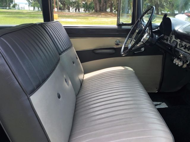 Blue and White 1956 Ford Fairlane Sedan with Gray and White interior