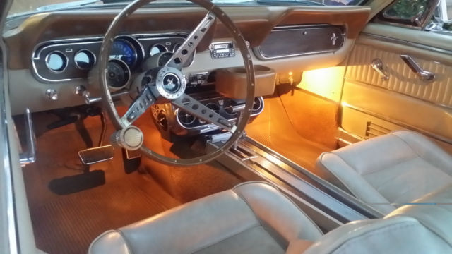 Medium Palomino Metallic 1966 Ford Mustang Fastback with Parchment w/ Palomino interior