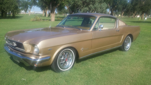 Medium Palomino Metallic 1966 Ford Mustang Fastback with Parchment w/ Palomino interior