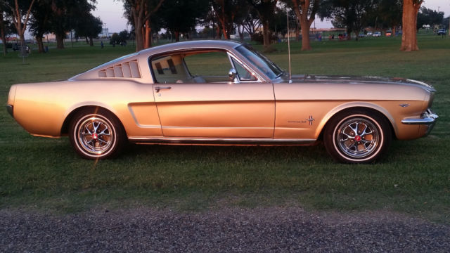 Medium Palomino Metallic 1966 Ford Mustang Fastback with Parchment w/ Palomino interior