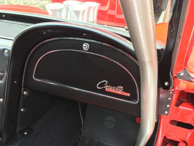 Red 1964 Chevrolet Corvette Coupe with Red & Black interior