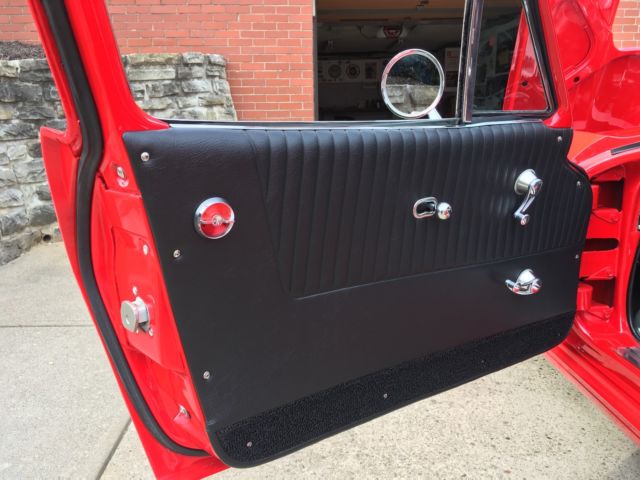 Red 1964 Chevrolet Corvette Coupe with Red & Black interior