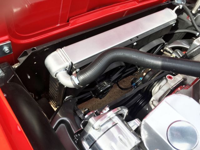 Red 1964 Chevrolet Corvette Coupe with Red & Black interior