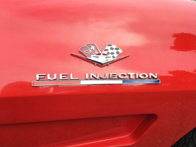 Red 1964 Chevrolet Corvette Coupe with Red & Black interior
