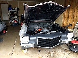 Unpainted 1971 Chevrolet Camaro Coupe with Green and black interior