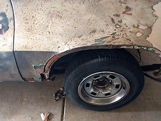 Unpainted 1971 Chevrolet Camaro Coupe with Green and black interior