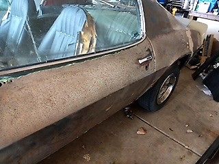 Unpainted 1971 Chevrolet Camaro Coupe with Green and black interior