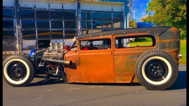 Rust 1930 Ford Model A with Red interior