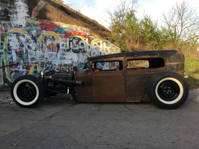 Rust 1930 Ford Model A with Red interior