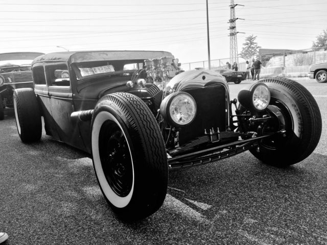 Rust 1930 Ford Model A with Red interior