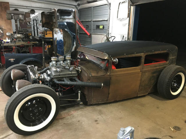 Rust 1930 Ford Model A with Red interior