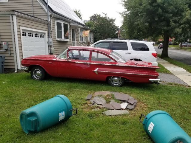 Red 1960 Chevrolet Bel Air/150/210 Coupe with Gray interior