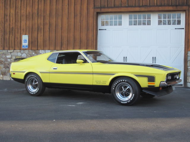 Yellow 1971 Ford Mustang Fastback with Black interior