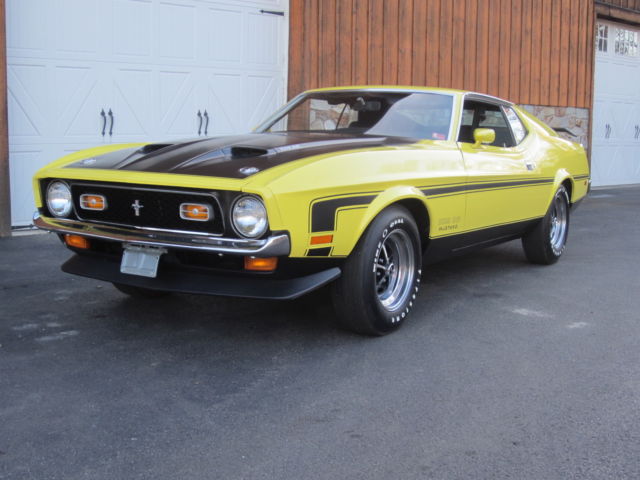 Yellow 1971 Ford Mustang Fastback with Black interior