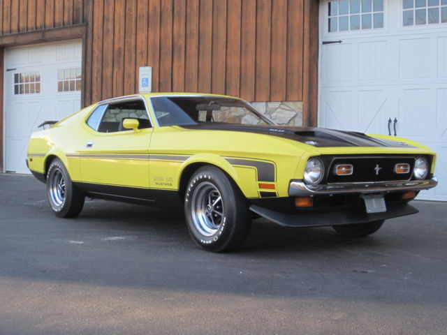 Yellow 1971 Ford Mustang Fastback with Black interior