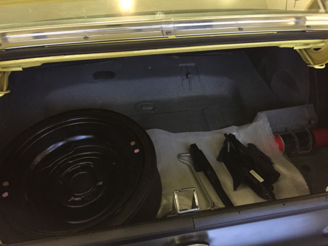 Yellow 1971 Ford Mustang Fastback with Black interior